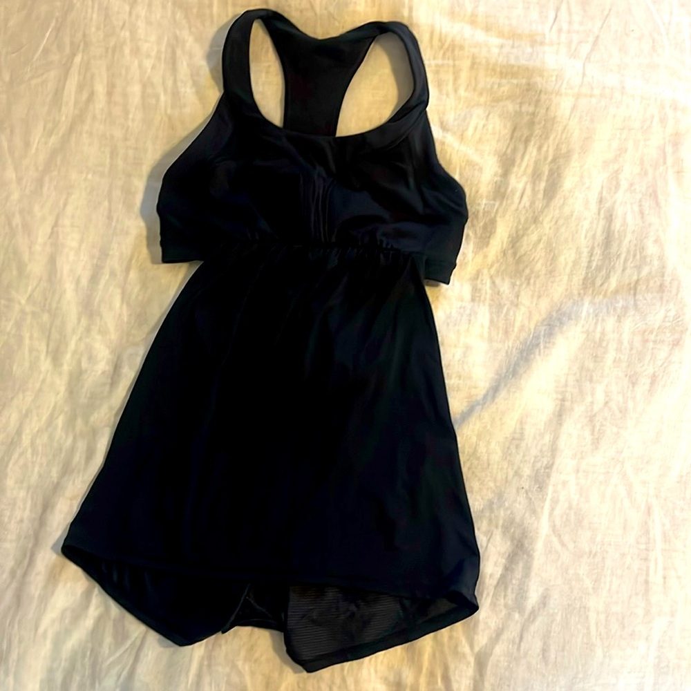 Black Lululemon athletic top. Size 6/8. Good condition plenty of wear left.